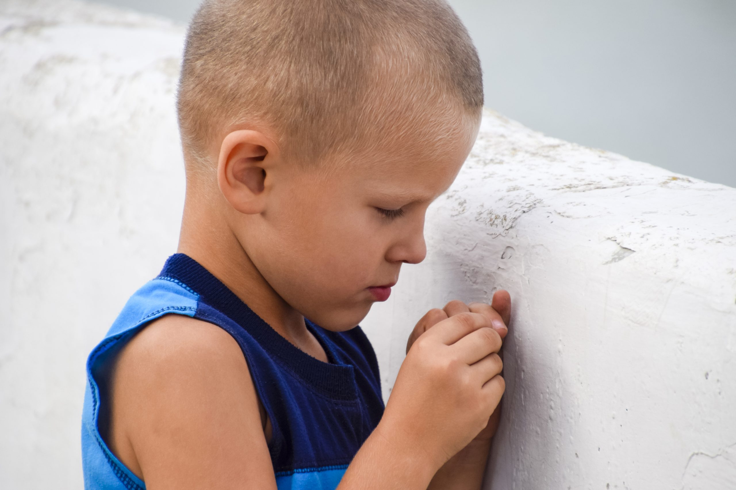 The Child Was Offended. Anger And Resentment Of A Little Boy. The Baby Is Crying